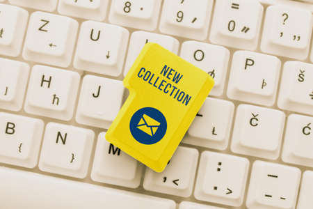 Writing displaying text new collection business concept contain a set of freshly designed clothes to be released soon typing cooking lesson guidebook retyping new online guidelines