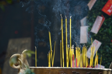 Smoking prayer sticks at asia pagoda