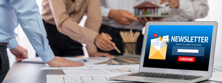 Group of interior architect designer discussing together on blueprint and laptop screen display for more precise designing layout modern home design and renovation insight Stock Photo