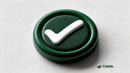 Green button with check mark on a white background close up
